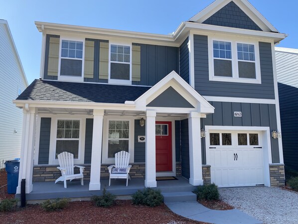 Front of house with our New Adirondack chairs! 