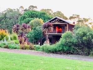 Beautiful natural garden at rear showing the sunset through the loft
