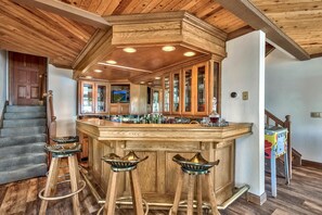 Lake Tahoe Lakefront with 25 feet of private beach  secluded Indoor large Hot tub and Game room with outdoor fireplace and sunset view decks.