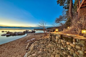 Lake Tahoe Lakefront with 25 feet of private beach  secluded Indoor large Hot tub and Game room with outdoor fireplace and sunset view decks. BBQ area your private beach is to the left