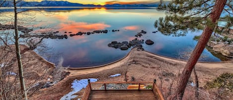 Lake Tahoe Lakefront with 25 feet of private beach  secluded Indoor large Hot tub and Game room with outdoor fireplace and sunset view decks.