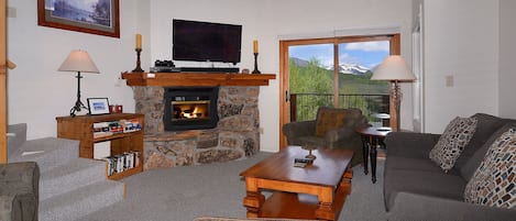 Living room, gas fireplace, smart TV