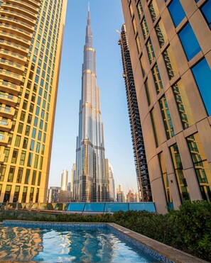 Pool View: Dive into luxury with stunning Burj Khalifa views from the refreshing pool!