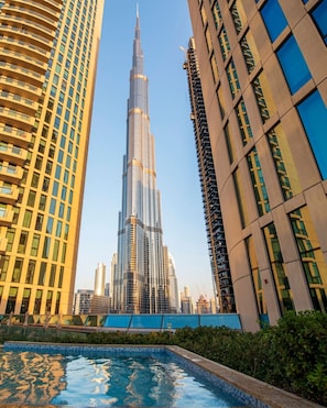 Pool View: Dive into luxury with stunning Burj Khalifa views from the refreshing pool!