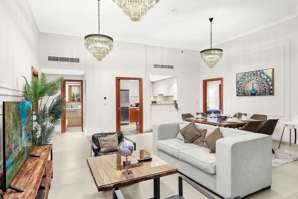 Living Room: Bright and airy with elegant decor, perfect for gathering after a day of adventure!