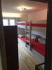 Chambre à coucher avec 4 lits superposés