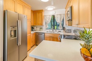 Island flavors at your fingertips! This fully-equipped kitchen is ready for you to whip up your favorite meals, with everything you need for the perfect vacation.