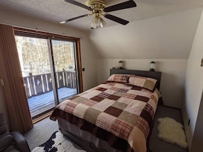 Master Bedroom on the second floor has a private balcony and 50" flat screen tv.