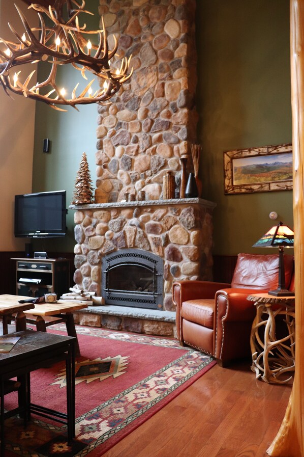 Ceiling to floor gas fireplace in the Great Room.