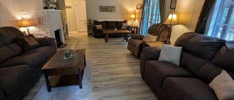 Large Living Room Has a New Couch, Love Seat, & a Queen-Size Sleeper Sofa