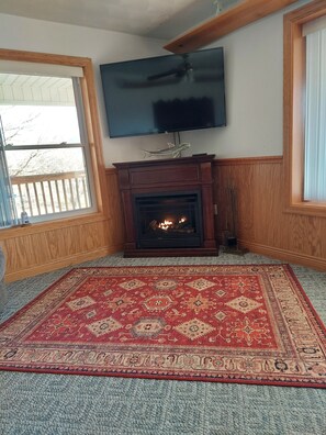 Grand  Room with fireplace and ROKO TV