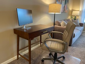 This apartment comes with a desk, office chair, and even a second monitor that you can connect to your laptop for dual screens!