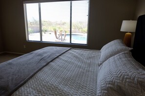 Master Suite with pool and back yard view