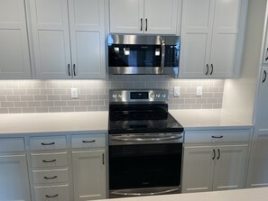 Bright modern kitchen fully equipped for whatever you are in the mood for!
