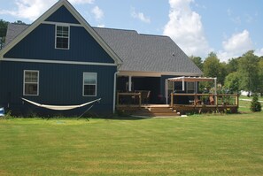 Rear view of house, you can relax in the hammock.