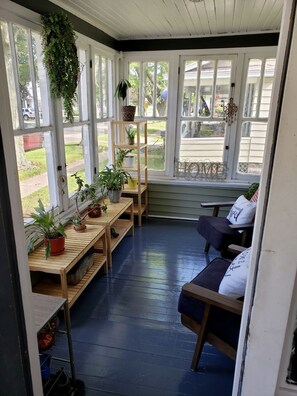 Enclosed porch portion