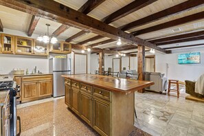 Spacious kitchen outfitted with cooking essentials.