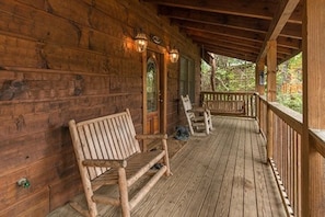 Front Porch with seating chair and swing.