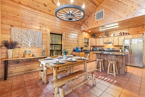 Authentic cabin furnishings w/ solid wood dining table & bar stools