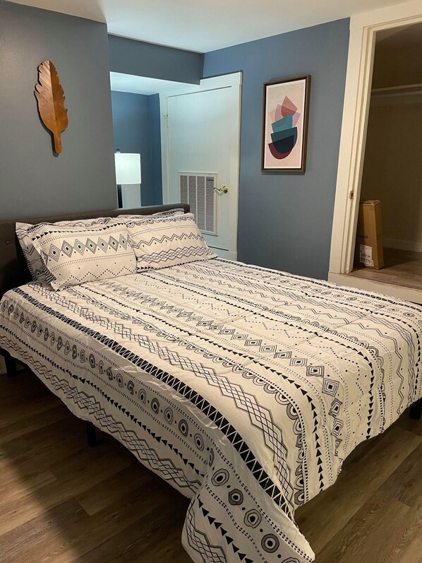 Featuring a queen bed with a comfortable mattress and luxurious bedding.