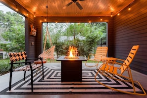 Covered patio lounge with firetable
