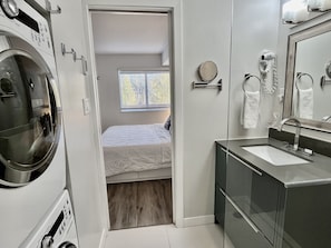 Ensuite bathroom with laundry.