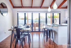 The open plan dining room and kitchen.