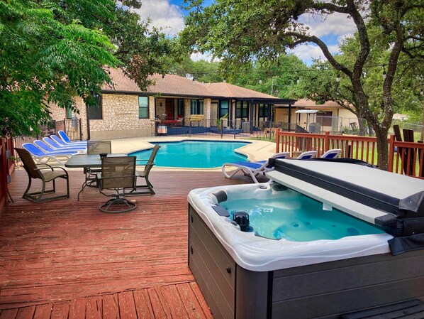 Enjoy the hot tub and swimming pool with family and friends.