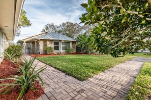 Brick walkway guiding you to your own home away from home.