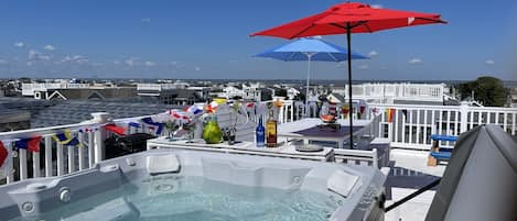 Enjoy your happy hour up on the roof-top deck