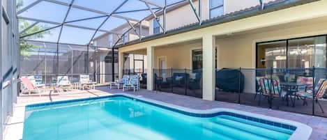 Large Covered Lanai, Patio Seating, Sun Loungers and Safety Fence