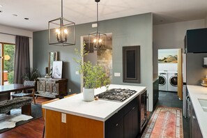 Custom kitchen with full laundry