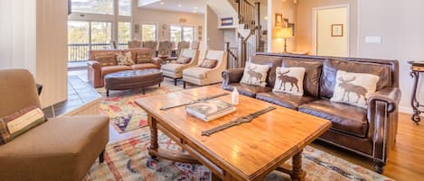 Living area featuring 180 degree panoramic mountain views. Plenty of seating for the whole family or friend group.