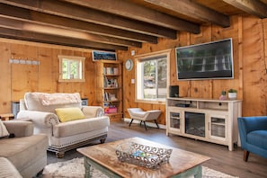 Living room with comfortable seating and TV