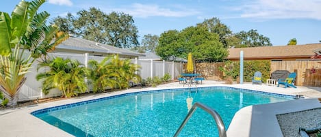 The large heated swimming pool is professionally serviced twice per week and has night lighting inside and around the pool area. Sun lounge area.  Outdoor shower.  Propane grill. Outdoor dining space for 8 guests.