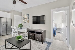 Living room with sleeper sofa. Smart TV.