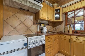Kitchen with wood burning furnace