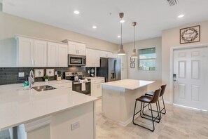 Fully equipped kitchen area.