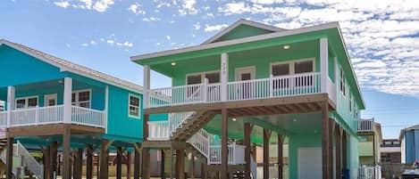 Traditional stilt beach home with front porch to enjoy coffee and watch the sun rise.