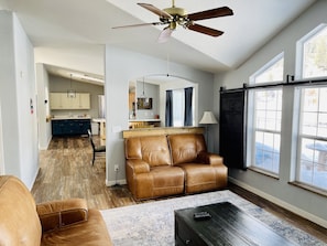 Family Room with fireplace, TV and power recliners 