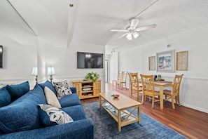 Relax in the cozy living room or head out to the oceanfront balcony!