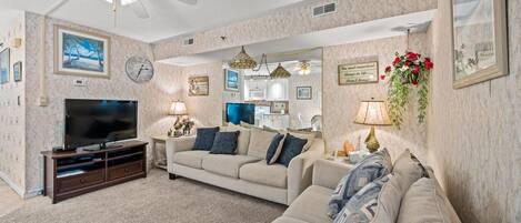 Gather the family for a movie night in the comfy living room.