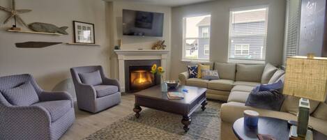 Gorgeous living room with gas fireplace.