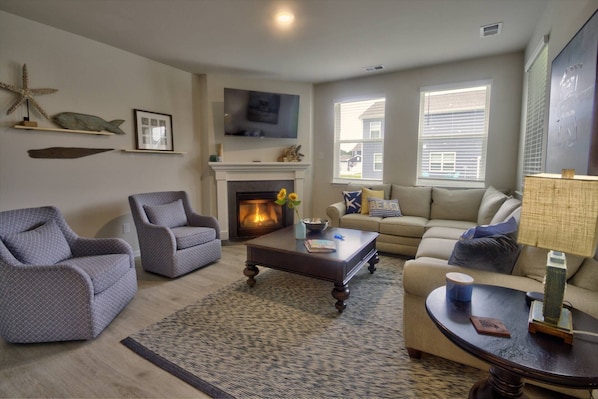 Gorgeous living room with gas fireplace.