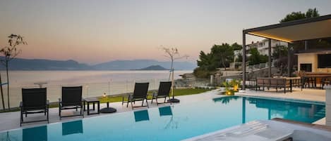 Heated pool on a private terrace of a Croatia luxury holiday villa Paradise with private pool, jacuzzi and gym on Ciovo