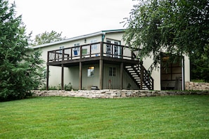 Guest quarters is a 3 bedroom in the upper level with balcony.