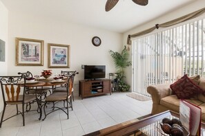 Bright and cozy living area with natural light and comfortable seating for your enjoyment.