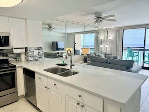 New quartz countertops, new tile backsplash, plenty of counterspace!