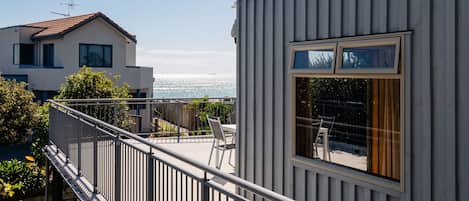 This property is located one back from the beach and enjoys tranquil sea views.
