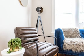 Kick up your tired feet in this cozy modern armchair